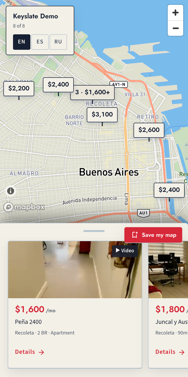 Keyslate map on a phone: index plates with prices over a city map, a card rail below